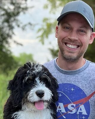 Josh Colter with Coda, the family dog